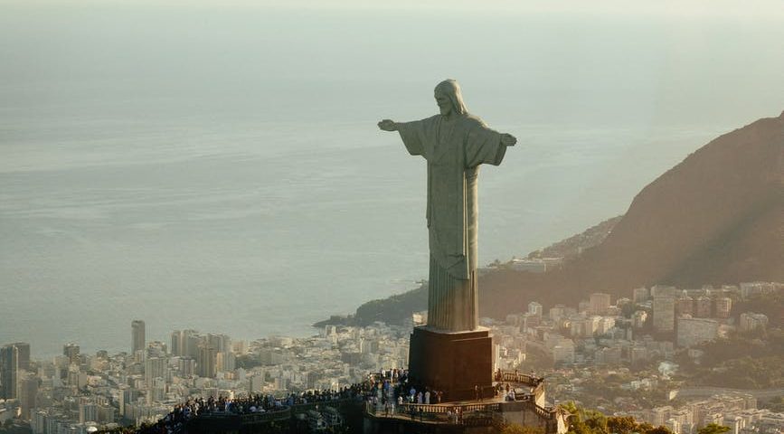 statue of jesus christ on mount in evening